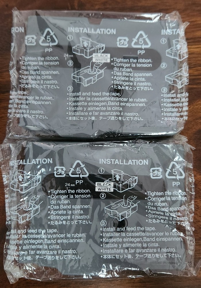 (2) Brother 24 mm 1 inch Black On White Ribbons. New In Package (No Box).