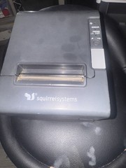 Working Squirrel Systems POS Receipt Printer with power cord.