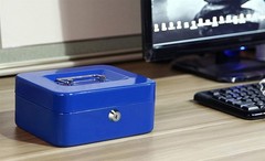 Portable Cash Box with Multiple Compartments and Durable Steel Construction