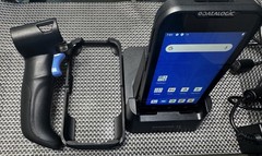 Datalogic MEMOR 10 with charger, docking cradle, protective case, and trigger.