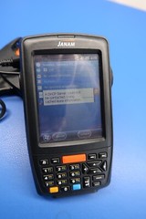Janam Technologies XM66W-1NAKBV00 Windows Mobile Computer with charging cradle