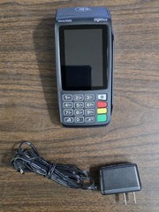 Ingenico Move/5000 Card Reader Terminal with charger. Batteries hold charge