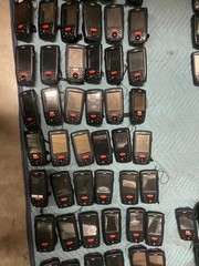 large lot of Janam barcode handheld scanners XP20W XM66W charging stations docks