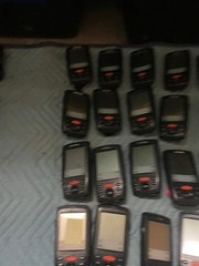 large lot of Janam barcode handheld scanners XP20W XM66W charging stations docks
