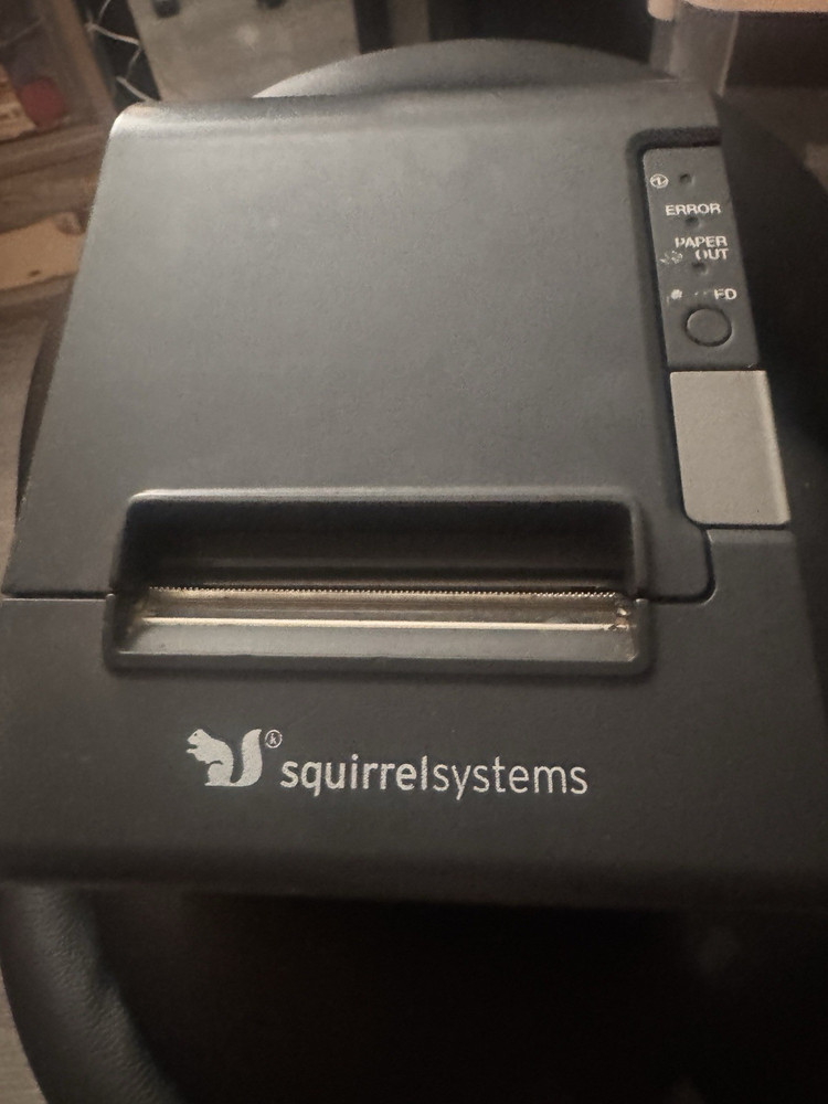 Working Squirrel Systems POS Receipt Printer with power cord.