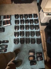 large lot of Janam barcode handheld scanners XP20W XM66W charging stations docks