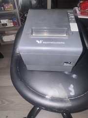 Working Squirrel Systems POS Receipt Printer with power cord.