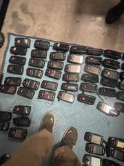 large lot of Janam barcode handheld scanners XP20W XM66W charging stations docks