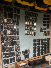 large lot of Janam barcode handheld scanners XP20W XM66W charging stations docks