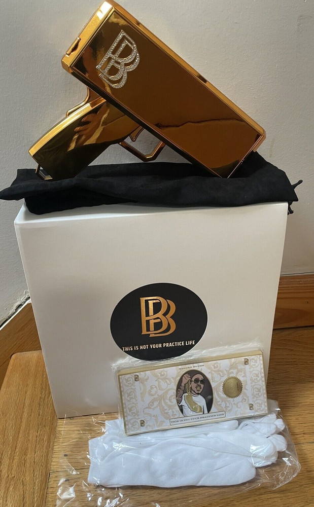 ICED OUT Ben Baller Gold Money Gun 2.0 With Ben Baller Bucks