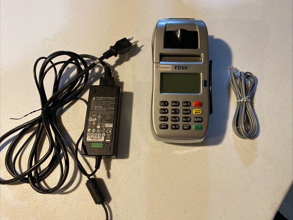 First Data FD50 EMV NFC (Dial/IP) Credit Card Machine With AC Adapter