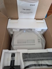 New Epson TMU950 and TMU220A receipt printers and box of TMU950 ribbons