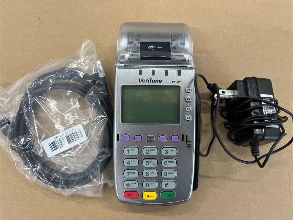 Verifone VX520 with either net cable and power cord.