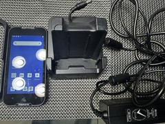 Datalogic MEMOR 10 with charger, docking cradle, protective case, and trigger.