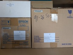 New Epson TMU950 and TMU220A receipt printers and box of TMU950 ribbons
