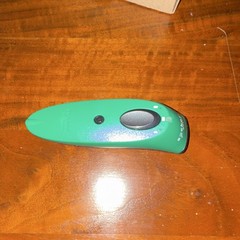 Socket Mobile S700 USB Barcode Scanner with charging cable and manual