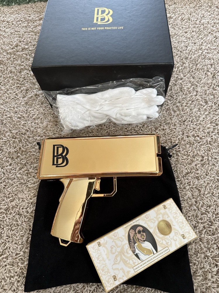 BEN BALLER GOLD MONEY GUN Used
